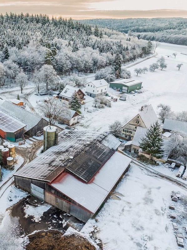 Detailed close-up of snow-covered buildings in a rural setting, Haselstaller Hof, Calw district, Black Forest, Germany