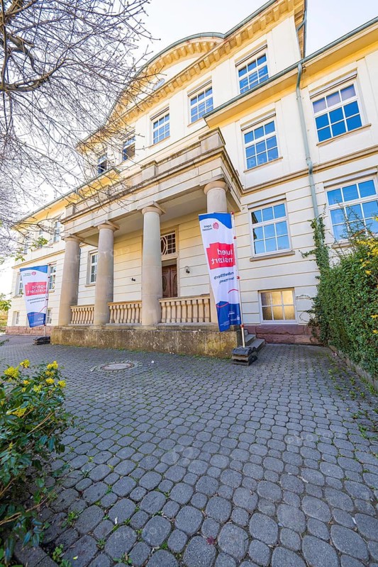 Facade of a historic building with banners of the 'Jugend musiziert' competition, Jugend Musiziert, Nagold, Germany