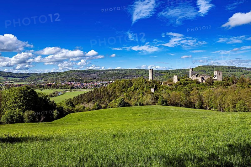 Wide green landscape with castle and bluish sky, The Brandenburg ruins near Gerstungen in Thuringia in the Werra valley