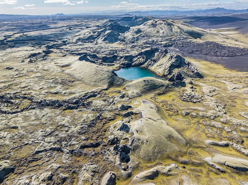 Lake in Tjarnargigur crater, moss-covered Laki crater or Lakagígar, series of craters, aerial view, interior highlands of Iceland, Suðurland, Iceland