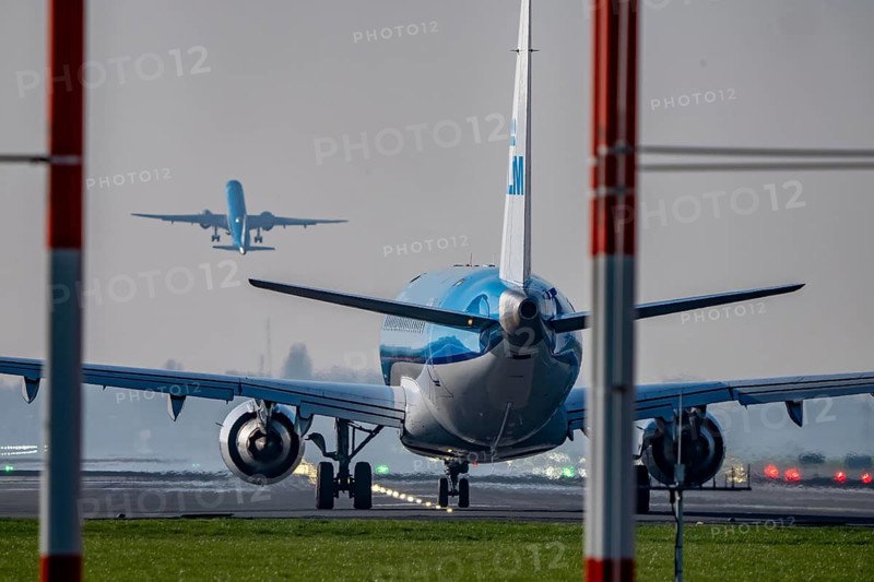 Amsterdam Schiphol Airport, Aalsmeerbaan runway, 18L-36R, KLMflieger on the runway, waiting for take-off, other aircraft taking off, Netherlands
