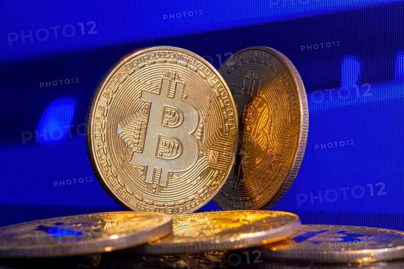 Close-up of symbolic bitcoins