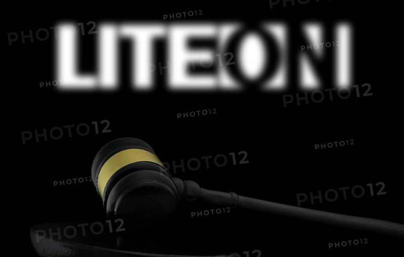 Court gavel in front of the Lite on logo. Lite-On is a Taiwanese company