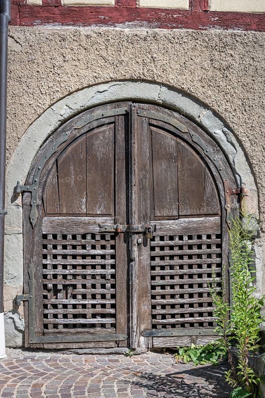 Old wooden Tor tor on a half-timbered house, in the old town centre of Meersburg on Lake Constance, Lake Constance district, Baden-Württemberg, Germany