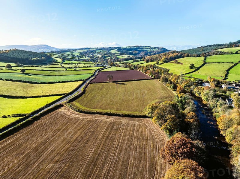 Fields and Farms over River Usk from a drone, Brecon, Brecon Beacons, Powys, Wales, England, United Kingdom