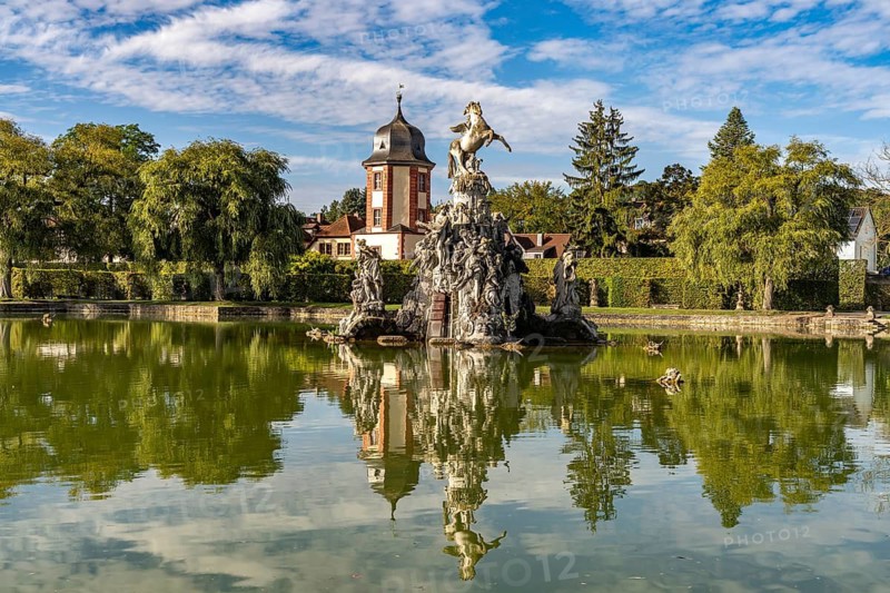 The Great Lake with the Musenberg Parnassus, castle and rococo courtyard garden Veitshöchheim, Lower Franconia, Bavaria, Germany