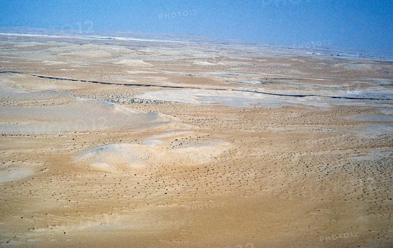 Photo of the Arabian desert taken by a helicopter pilot working in the oil industry in Dharhan, Saudi Arabia, 1979