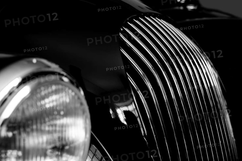 Car Lamps and Car Grille on the Front of a an Old Classic Car in Switzerland
