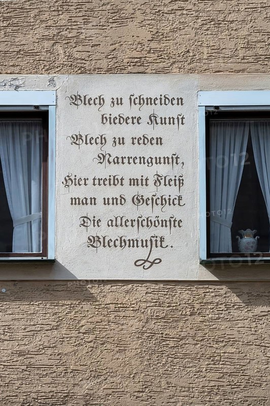 Slogan on a house of a manufacturer of metal wind instruments, Iphofen, Lower Franconia, Bavaria, Germany