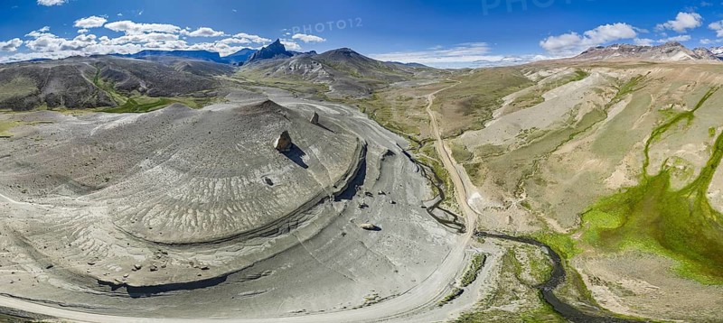 Road Ruta 41, gravel road, arid landscape, Mt. Cerro Boleadoras, volcano-shaped rock formation, Los Antiguos - Paso Roballo, aerial view, Argentina