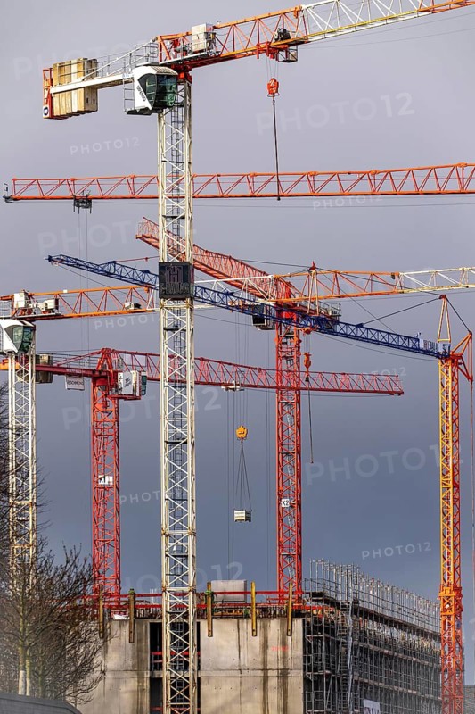 Construction cranes on 2 large construction sites Wohnbau, Geschäftsgebäude, Krefeld North Rhine-Westphalia, Germany