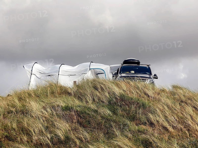 A Mercedes V-Class motorhome standing in the dunes of a campsite, Vejers, Denmark, 16 07 2023