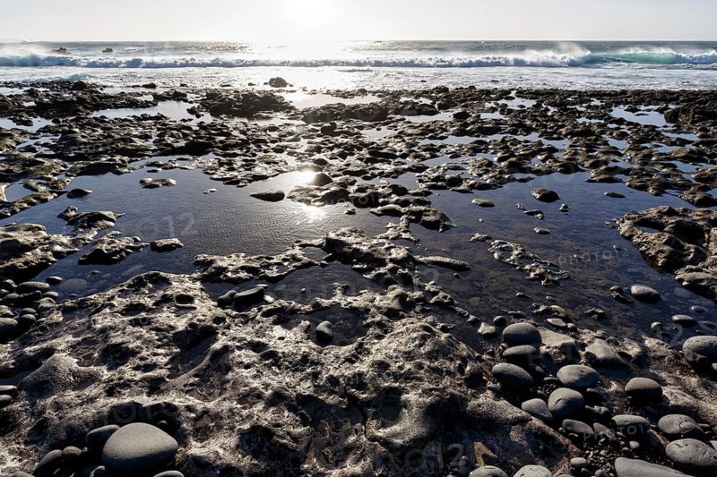 Rocky west coast, black lava coast, coastline, backlight, El Golfo, Yaiza, Lanzarote, Spain