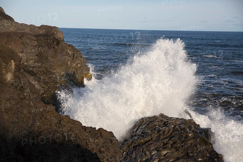 Crashing waves. Coast at Dyrholaey. Dyrholaey has been a natural reserve since 1978. South Iceland