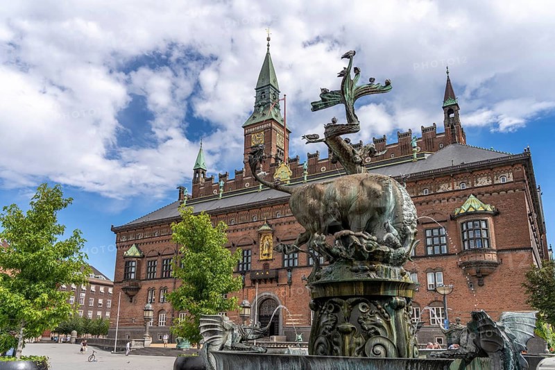 The Dragespringvand dragon fountain and Copenhagen City Hall, Copenhagen, Denmark