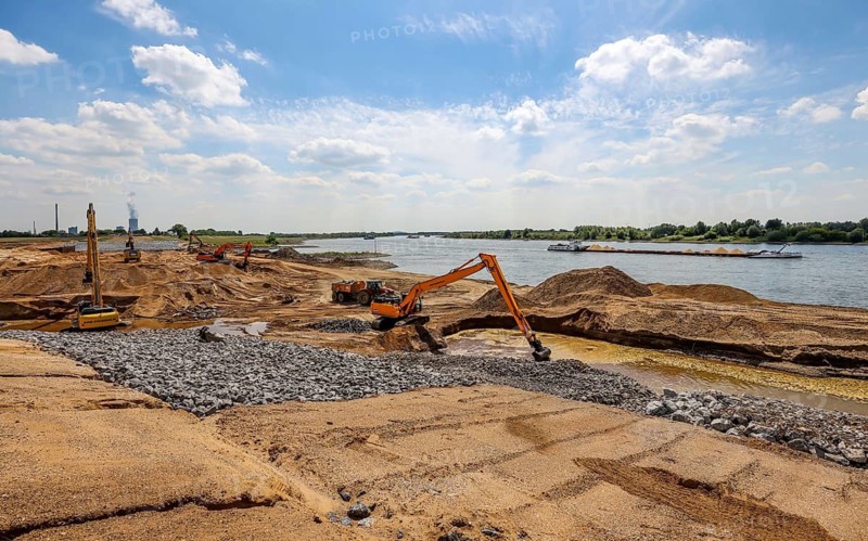 Dinslaken, Voerde, North Rhine-Westphalia, Germany, Emscher estuary into the Rhine. Construction site of the new Emscher estuary. The mouth of the Emscher into the Rhine is being moved almost 500 metres north from Dinslaken to Voerde. Fish will then be able to swim barrier-free up the new Emscher from the Rhine through a newly created floodplain area. Following the construction of a parallel sewer, the Emscher has been completely free of sewage since January 2022. The river was previously an open, above-ground combined sewer with rainwater and wastewater