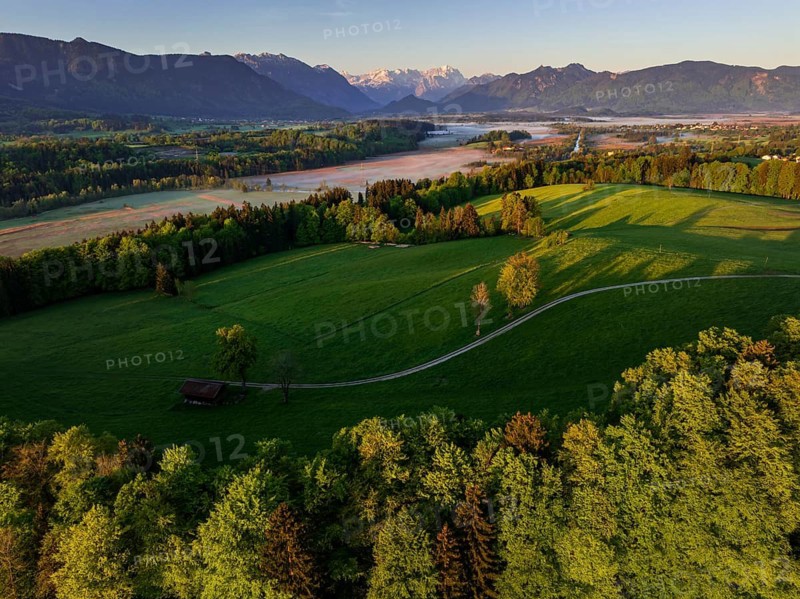 Aerial view, trees, forest, meadow, light green leaves, morning light, fog, mountains, sunny, spring, near Murnau, behind Zugspitze, foothills of the Alps, Bavaria, Germany