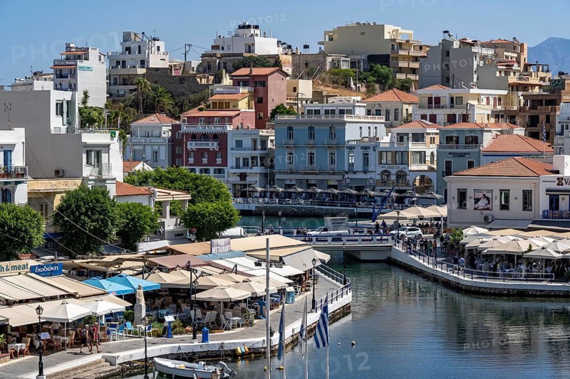 The village of Agios Nikolaos, in the eastern part of Crete, view over Lake Voulismeni, connected to the sea, old town, Greece