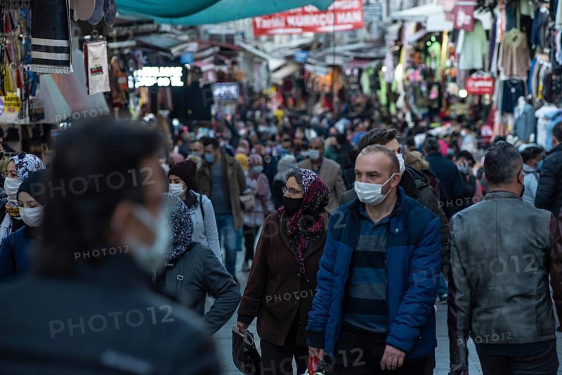 Istanbul, Turkey. November 28th 2020 Shoppers wearing face masks in a crowded Bazaar on the European side of Istanbul, Turkey