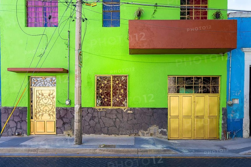 Colorful colonial Guadalajara houses and streets in historic city center Centro Historico near Guadalajara Basilica Cathedral and Liberation Square, Plaza Liberacion