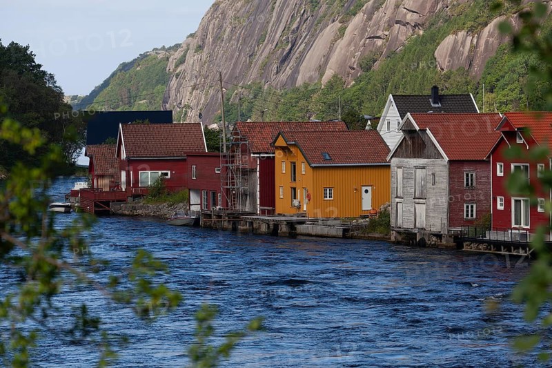 Historical wooden houses in a sleepy village by the river. Summer, Sireåna (Sireåna), Agder, Norway