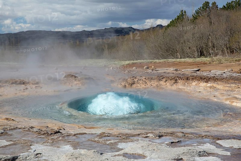 Strokkur is a fountain geyser located in a geothermal area in the southwest part of Iceland. It is one of Iceland's most famous geysers. It is erupting once every 8-10 minutes