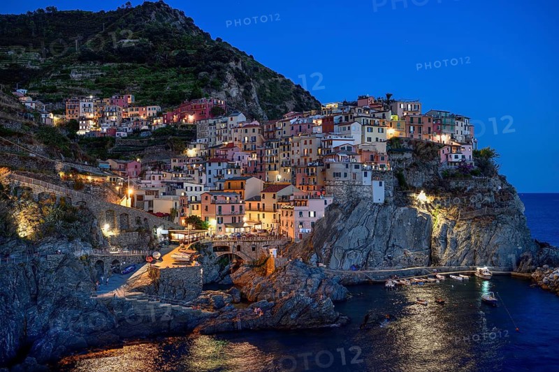 Fishing village of Manarola, blue hour, blue hour, district of Riomaggiore, Cinque Terre, province of La Spezia, Liguria, Italy