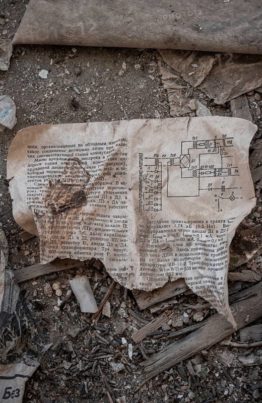 Remains of an instruction manual with circuit diagram in Cyrillic script in an abandoned building, ghost town, Engilchek, Tian Shan, Kyrgyzstan