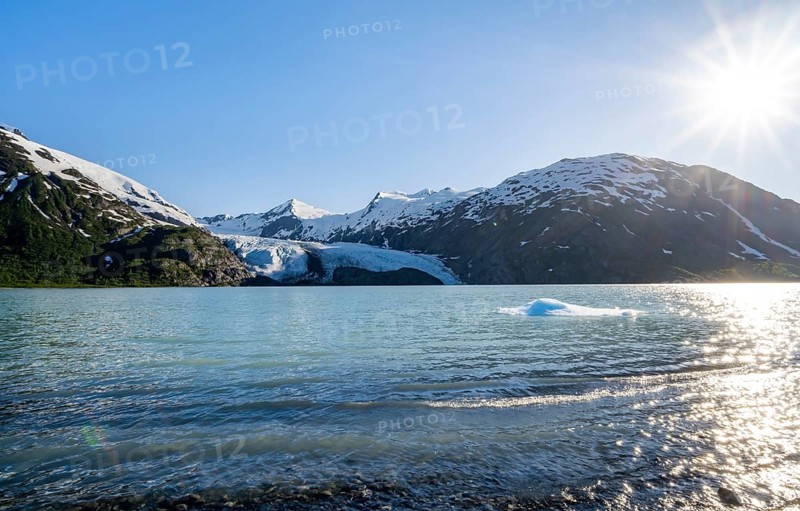 Snowy mountains and glaciers Portage Glacier on Portage Lake glacial lake, Chugach National Forest, Alaska, USA