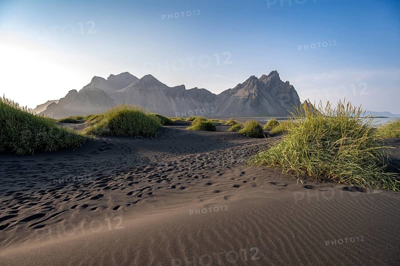 Black beach with volcanic sand, sandy beach, dunes with grass, Stokksnes headland, Klifatindur mountain range, Austurland, East Iceland, Iceland