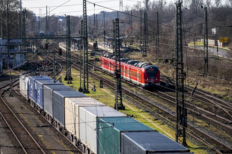 Local trains on the line, container trains in the freight yard, so-called installation tracks in Duisburg-Rheinhausen, freight trains are parked here at short notice in front of continuing their journey, either to the trimodal terminal in Logport Duisburg or from there to distant destinations, such as China, as part of the new Silk Road, North Rhine-Westphalia, Germany