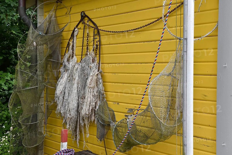 Fisherman's house, fishing hut with nets and traps for fishing on Heligoland, Schleswig-Holstein, Germany