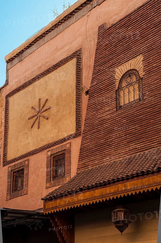 Restored facade, ornament, decoration, ornamentation, art, architecture, clay plaster, building material, alternative, Arabic, oriental, house, house facade, warm colours, warm tones, Marrakech, Morocco