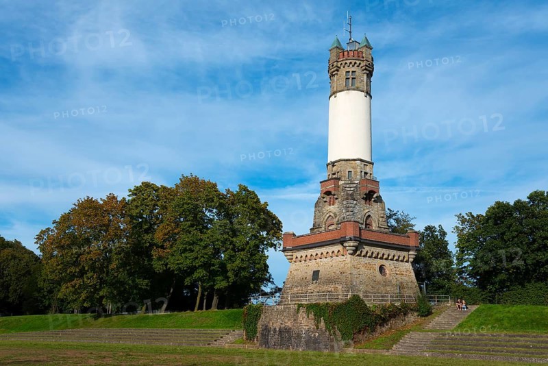 Impressive historic tower in a park with trees and blue sky, Harkortturm, Wetter an der Ruhr, North Rhine-Westphalia, Germany