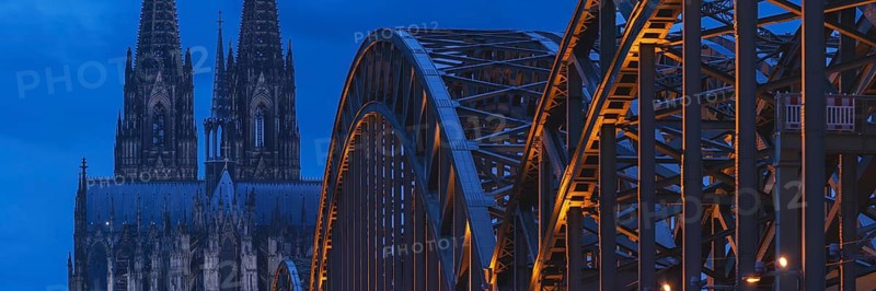 Cologne Cathedral and the Hohenzollern Bridge illuminated with LED lights, Cologne, North Rhine-Westphalia, Germany