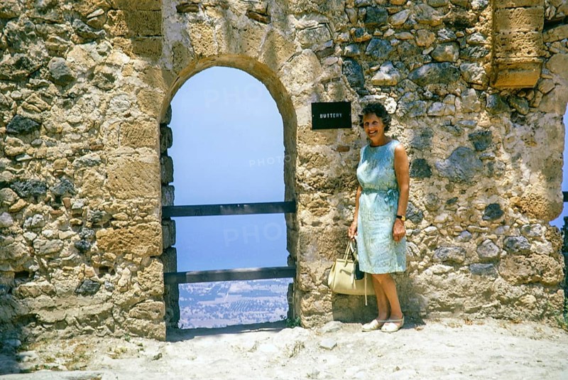 Woman tourist standing in Saint Hilarion Castle, Kyrenia or Girne, Northern Cyprus, Cyprus, Europe 1973