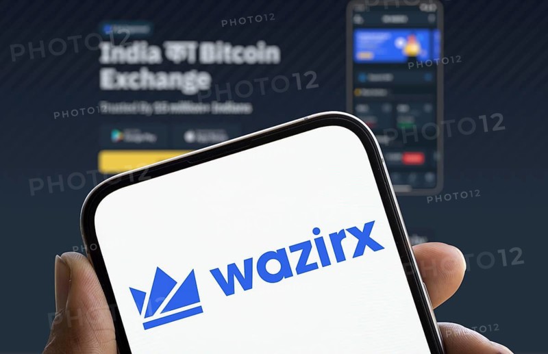 WazirX logo is displayed on smartphone. WazirX is an Indian cryptocurrency trading platform