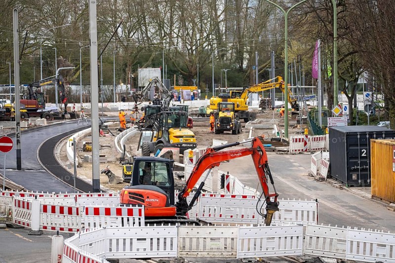 Large construction site in the city center of Essen, the large intersection of Hollesstraße and Steeler Straße is being completely rebuilt and renovated, supply lines, sewage, gas, water and the construction of new road infrastructure and new tracks for the new Stadtbahn-Essen, a new tram line in the city center, North Rhine-Westphalia, Germany