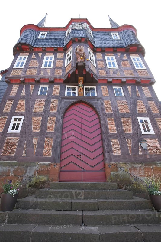 Red-brown house facade with wooden gate, historic town hall, view upwards, brick house, landmark, Frankenberg, Hesse, Germany
