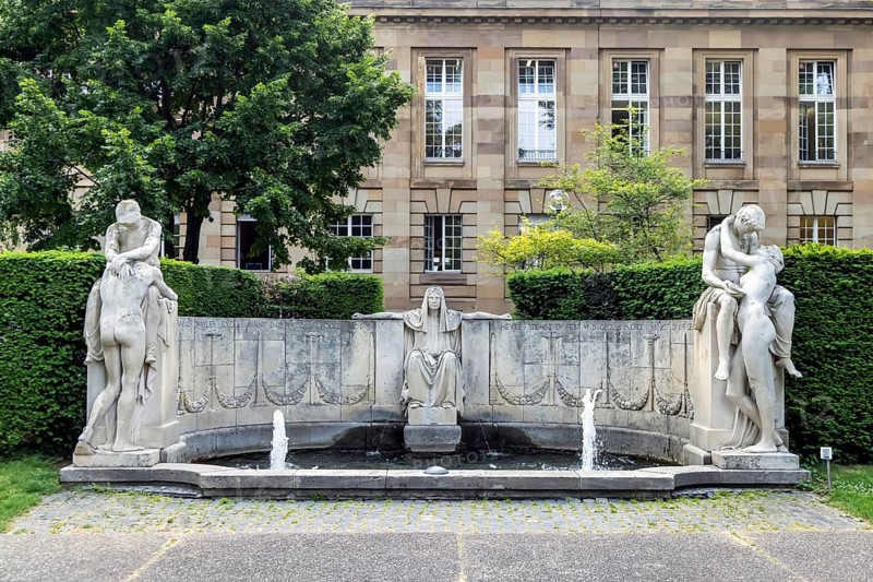 Fountain of Destiny in the Upper Palace Gardens in Stuttgart, which was created in memory of the opera singer Anna Sutter, who was murdered in 1910. It was designed in 1914 by the sculptor Karl Donndorf in Art Nouveau style. Stuttgart, Baden-Württemberg, Germany