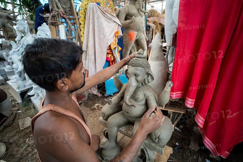 Artisan work on idols of the elephant-headed Hindu deity Ganesha at a workshop ahead of the Ganesh Chaturthi festival, in Guwahati, Assam, India on 3 September 2024