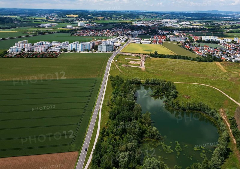 Drone image, shoring in grassland with pond, housing estate, high-rise housing estate, Asten, Linz Land district, Upper Austria, Austria