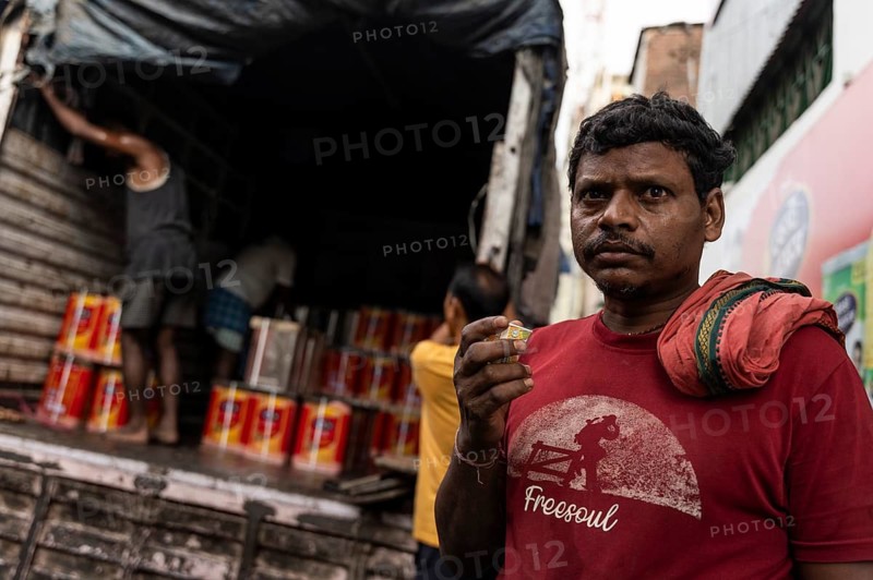 GUWAHATI, INDIA - MAY 1: Labourers carries goods in a wholesale market, in Guwahati, India, on May 1, 2025. May Day or Workers Day is a global holiday celebrated on May 1st to honor workers and their contributions