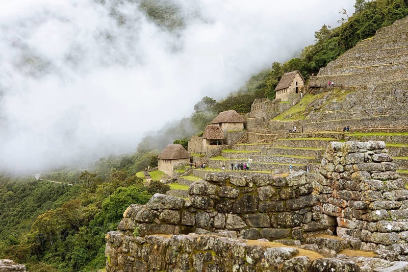 Inca ruins of Machu Picchu in the clouds, Cusco region, Peru