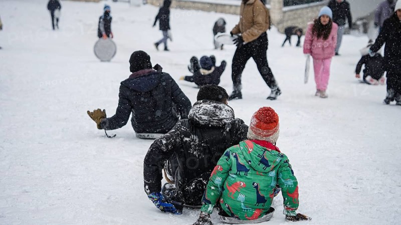 In Gaziantep, Turkey, on December 31, 2025, children and families enjoy winter activities as they play on snow-covered areas and slide on icy hills, creating a lively atmosphere across the city during the final day of the year, Gaziantep, Gaziantep, Turkey