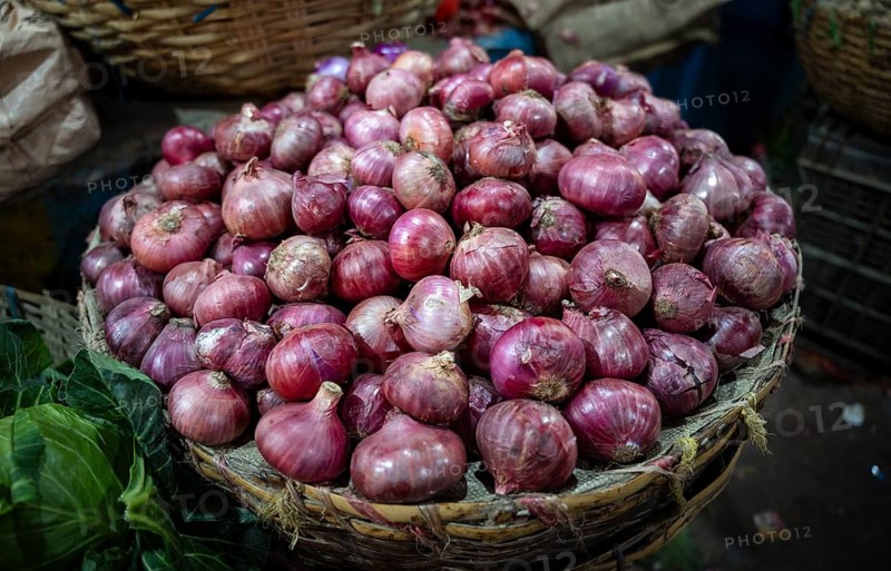 Onions displayed for sell in a market