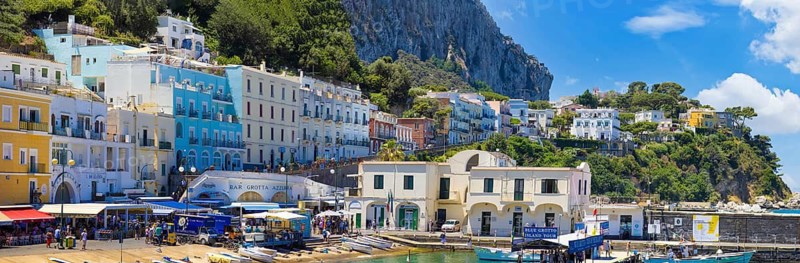 Capri, Campania, Italy, June 16, 2022: Italy, scenic views of Capri Island Bay. Ships yachts and ferries in Capri harbor