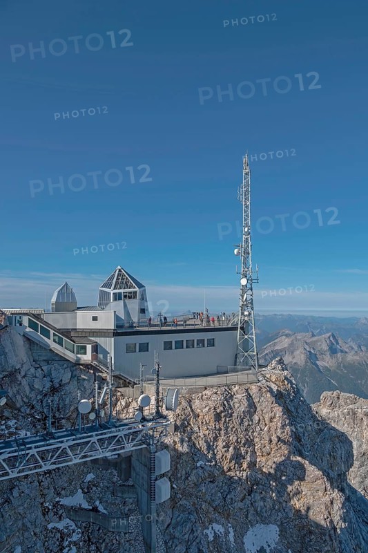 Mountain station and antenna on a rocky peak under a clear sky in the Alps, Zugspitze, Garmisch-Partenkirchen, Werdenfelser Land, Bavaria, Germany