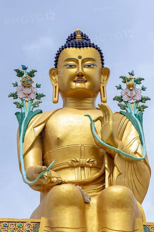 Majestic golden Buddha statue set against the serene backdrop of Zanskar Valley in Ladakh, India. Captures the spiritual essence and cultural richness of the region