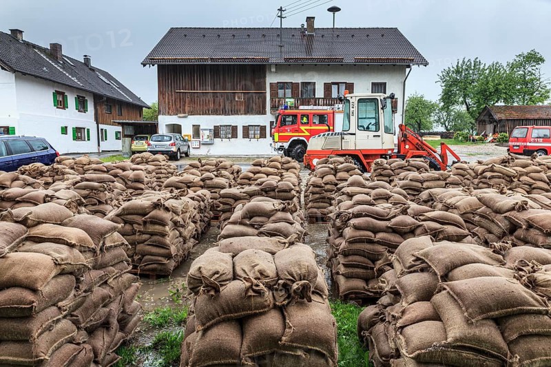 Sandbags, continuous rain, high water, flooding, fire brigade, town, houses, Whitsun floods 2013, climate change, Schlehdorf, Alpine foothills, Bavaria, Germany